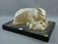 A Studio pottery cubist style model of a cat with her kittens recumbent on a black painted plinth