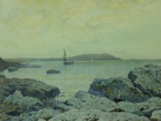 JOHN McDOUGAL watercolour - rocky Anglesey coastalscape with boats, signed and dated 1932, 23 x 34