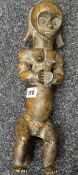 An Equatorial Africa, probably Fang-tribe (Gabon), carved seated reliquary-type figure, 37cms high