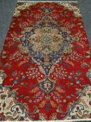 Red ground Persian Tabriz, 264 x 163 cms