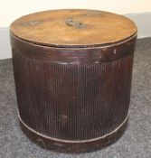 A nineteenth century cylindrical hat-box, having a corrugated outer wall and hinged lid with brass