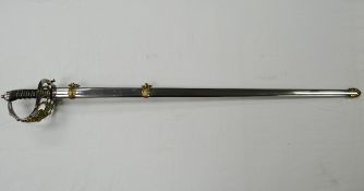 A reproduction household cavalry sword in scabbard