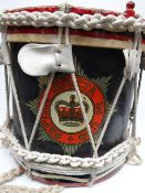 A regimental drum with painted crest