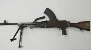 A deactivated British .303 Bren Gun Mark II in fine condition with bipod, handle and magazine