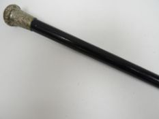 A large Monmouthshire Regiment swagger stick with white metal battle honours tip