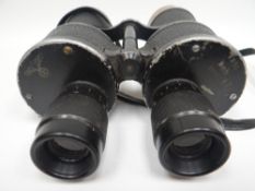 A pair of Leitz 7x50 WWII Kriegsmarine binoculars with leather strap