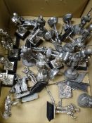 A large quantity of cast metal figurines