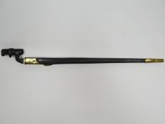 A socket bayonet with War Department markings on blade and black leather brass mounted scabbard