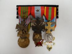 French Indo-China group of nine medals consisting of Croix de Guerrre 1939; Croix de Guerre
