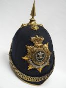 A Welsh Regiment officer's blue cloth helmet with liner marked 'Hawkes & Co.' - Note: This is a