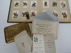A Princess Mary 1914 Christmas tobacco tin containing enveloped Christmas card with cipher