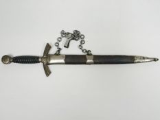 A German Third Reich first-pattern Luftwaffe Dagger with sunwheel swastikas, wire grip and plain