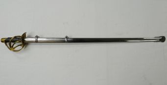 A reproduction heavy cavalry sword in scabbard
