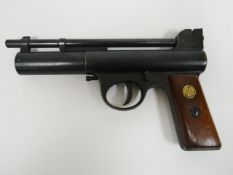 A Webley Mk I air pistol with gilt button wings logo