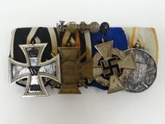 Imperial and Nazi German group of five medals consisting of Iron Cross 1914; Cross of Honour; 25