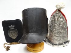 Three helmets to include two Napoleonic-style
