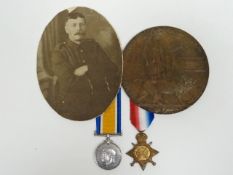 A pair of WWI medals, Death Plaque and photograph to Pte. S. Roberts, Welsh R. consisting of 1914-15