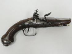 A late eighteenth century French flintlock side lock cannon- barrelled travelling pistol with