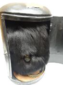 A Victorian officer's bearskin in metal carrying case with hinged door marked 'Honble R. Berlie,