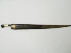 A large Northwest Frontier machete short sword with ivory coloured handle and decorative carved