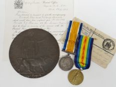 A WWI pair of medals Death Plaque and ephemera to Pte. E.J. Thomas, 15-Lond. R. consisting of WWI