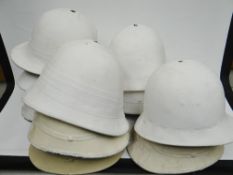 A quantity of pith helmets
