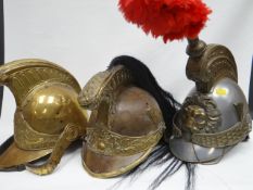 Three continental helmets to include French Cuirassier's and Fire Service helmet