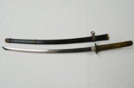 A good WWII Japanese Naval katana with anchor arsenal mark on tang, with black and gilt decorative