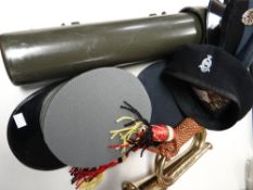 An RAF peaked cap, A keppi and two regimental berets together with a crested bugle and vintage