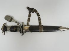 A German Third Reich Nazi SS Officers dagger with SS logo and skull engraved chain scabbard hanger