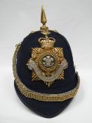 A Royal Regiment of Wales bandsman's blue cloth helmet