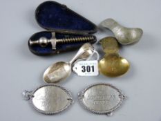 A cased white metal Champagne tap, a pair of oval white metal spirit labels - 'His Lordship's