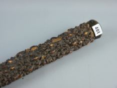 A briar wood native club, possibly of Dutch East Indies origin, 85 cms long and the bone top