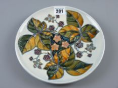 A Moorcroft Blackberry plate on a grey/blue ground, 22 cms diameter with underglazed blue