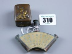 A metallic lidded, possibly stamp container with floral applied decoration and an Oriental shaped