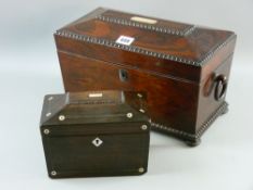 A Regency rosewood sarcophagus shaped tea caddy with mother of pearl escutcheon, turned ring carry