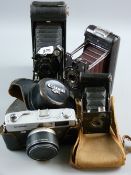A bakelite Model B by Soho Ltd, London with brown bellows, an Eastman Kodak no. 1A pocket camera
