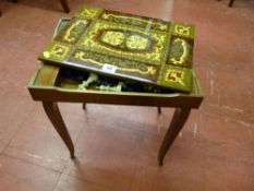 A 20th Century Italian inlaid games table with reverse top and associated turned wooden chess set