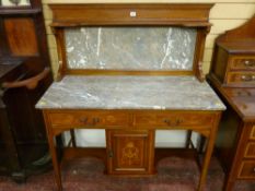 A circa 1900 inlaid and crossbanded mahogany marble topped washstand with twin frieze drawers and