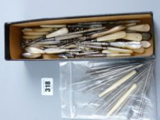 A large parcel of mainly mother of pearl handled button hooks etc