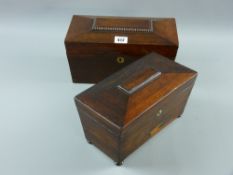 A Victorian rosewood sarcophagus shaped tea caddy with mother of pearl escutcheon on turned squat
