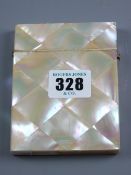A mother of pearl card case with end hinged lid and silver mounted lid