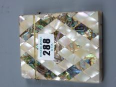 An abalone card case with inlaid mother of pearl, silver mount to the lid and end hinge