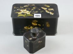 A late Victorian papier mache tea caddy with painted butterfly and flower decoration (worn to the