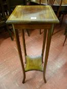 An Edwardian mahogany and line inlaid two tier plant stand, the top with diamond shaped satin wood