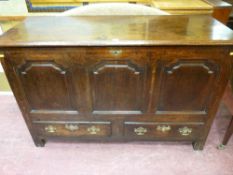 An 18th Century oak Lancashire style mule chest, well patinated with three front shaped and