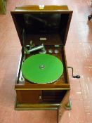An inlaid mahogany cased wind-up gramophone with twin opening sound box doors, interior label for '