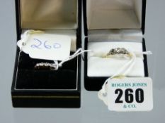 An eight carat gold five stone diamond ring, visual estimate of each stone, 0.07 carat, 2.4 grms