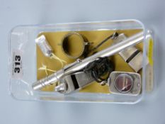 An Acme chrome whistle, a bright cut silver pendant whistle, a white metal encased miniature English