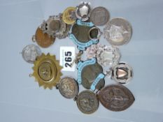 A parcel of silver and other sporting trophy pendants and commemorative medallions etc